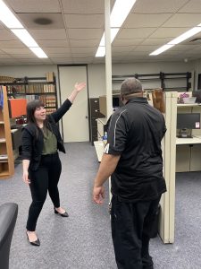 UMKC Expungement Clinic Law Student, Kylee Gomez, celebrates with her client after successfully obtaining an expungement!